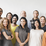 A group of diverse individuals celebrating Peer Review Week 21 together