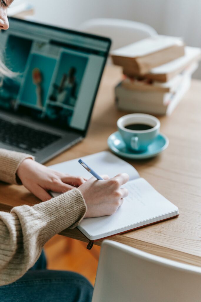 woman proofreading an article on paper