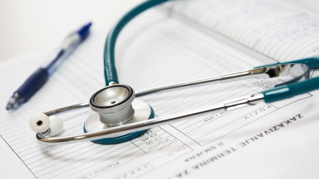 Stethoscope placed on a case report.