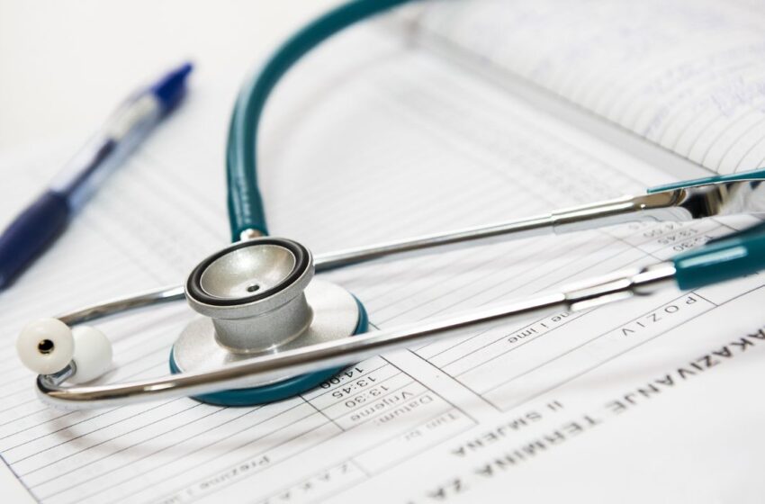 Stethoscope placed on a case report.